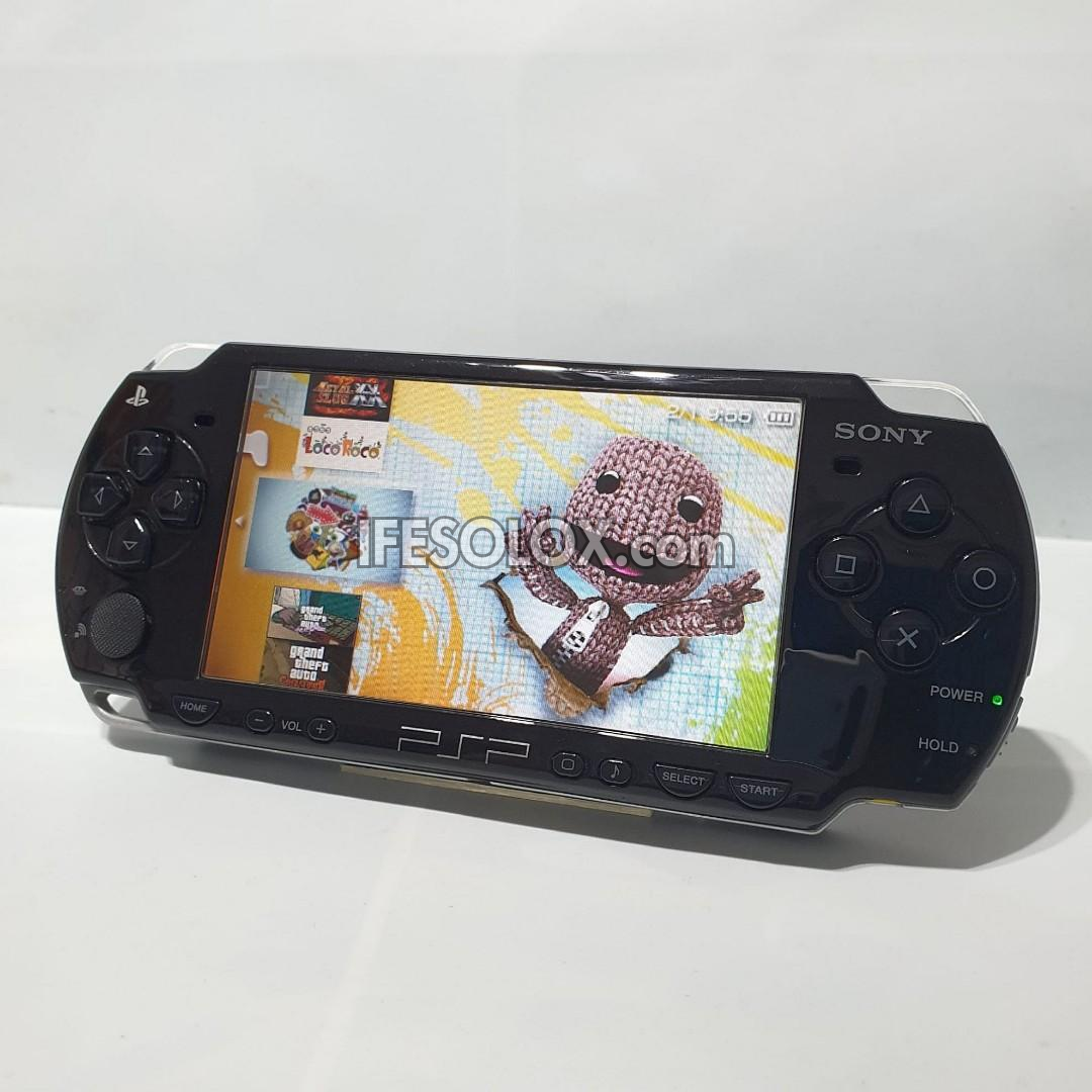 PlayStation Portable PSP 2000 series Slim Game Console with 16GB Memory Stick and 15 Games (Black) - Foreign Used