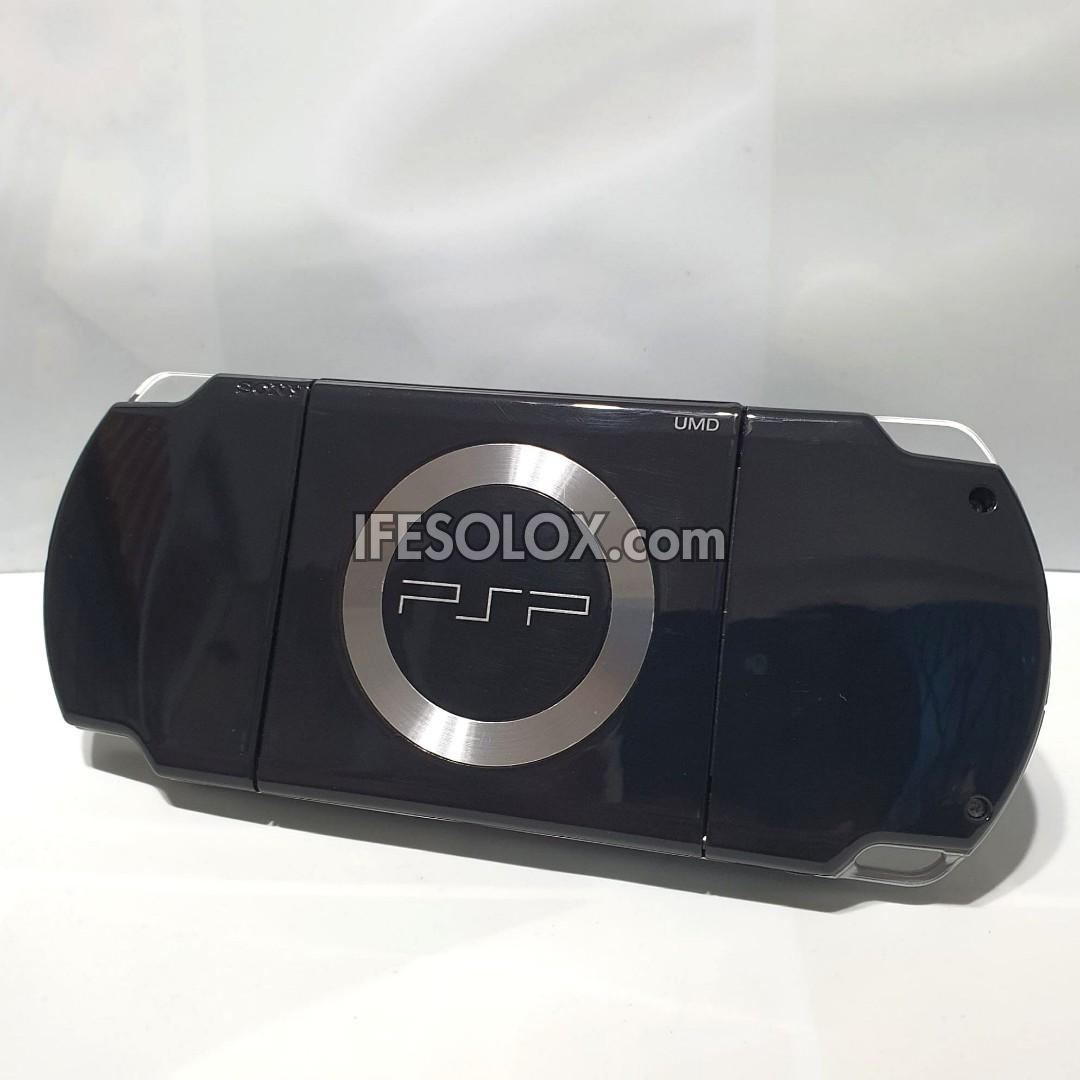 PlayStation Portable PSP 2000 series Slim Game Console with 16GB Memory Stick and 15 Games (Black) - Foreign Used
