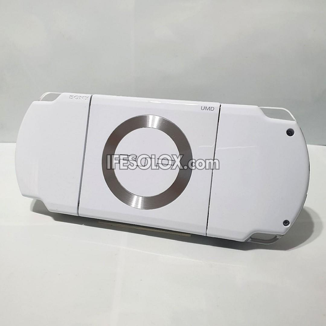 PlayStation Portable PSP 2000 series Slim Game Console with 16GB Memory Stick and 15 Games (White) - Foreign Used