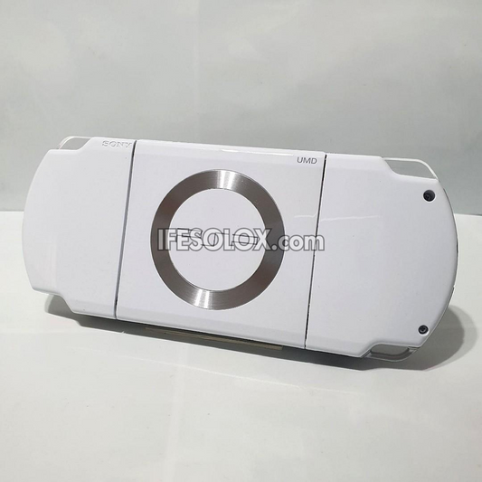 PlayStation Portable PSP 2000 series Slim Game Console with 16GB Memory Stick and 15 Games (White) - Foreign Used