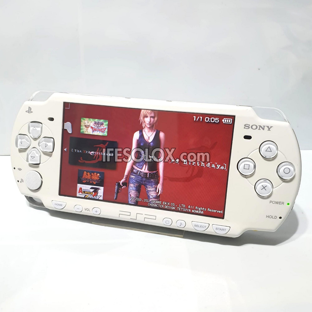 PlayStation Portable PSP 2000 series Slim Game Console with 16GB Memory Stick and 15 Games (White) - Foreign Used