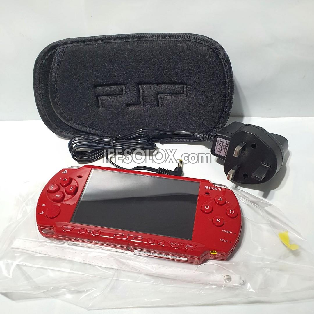 PlayStation Portable PSP 2000 series Slim Game Console with 16GB Memory Stick and 15 Games (Red) - Foreign Used