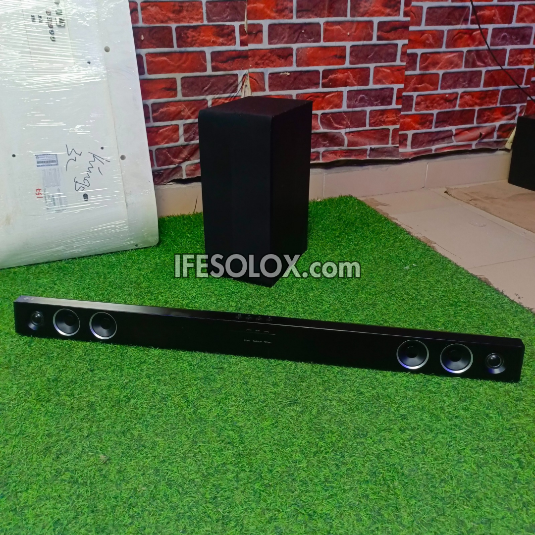 LG SH3B 2.1Ch 300W Bluetooth Sound Bar with Wireless Subwoofer (USB, Optical in, Aux) - Foreign Used