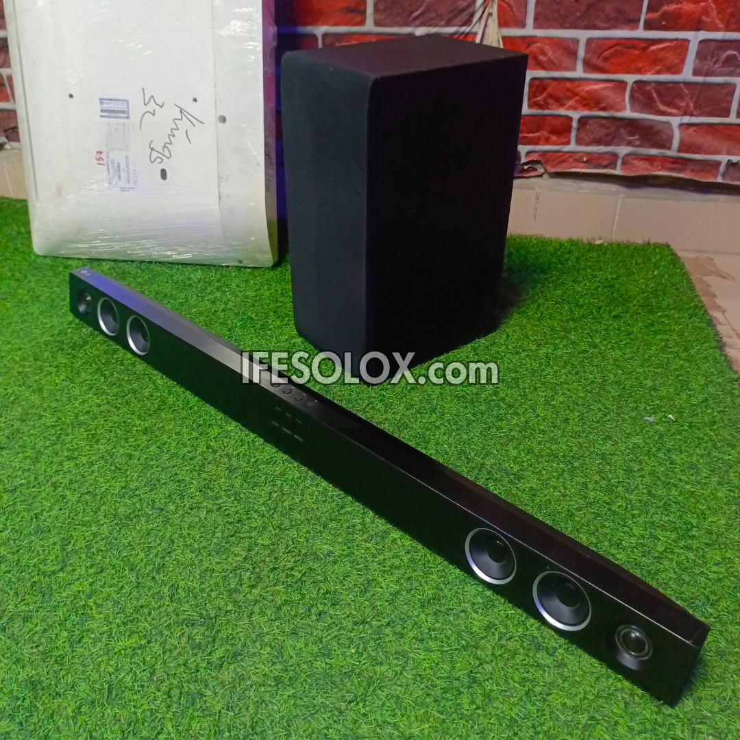 LG SH3B 2.1Ch 300W Bluetooth Sound Bar with Wireless Subwoofer (USB, Optical in, Aux) - Foreign Used