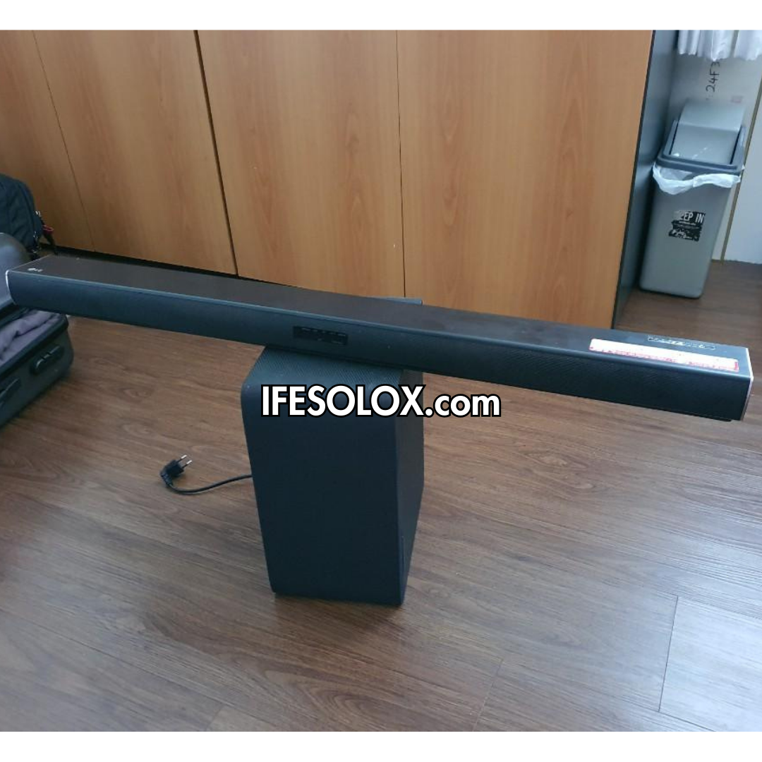 LG SH4 2.1Ch 300W Bluetooth Sound Bar with Wireless Subwoofer and HDMI (In & Out) - Foreign Used