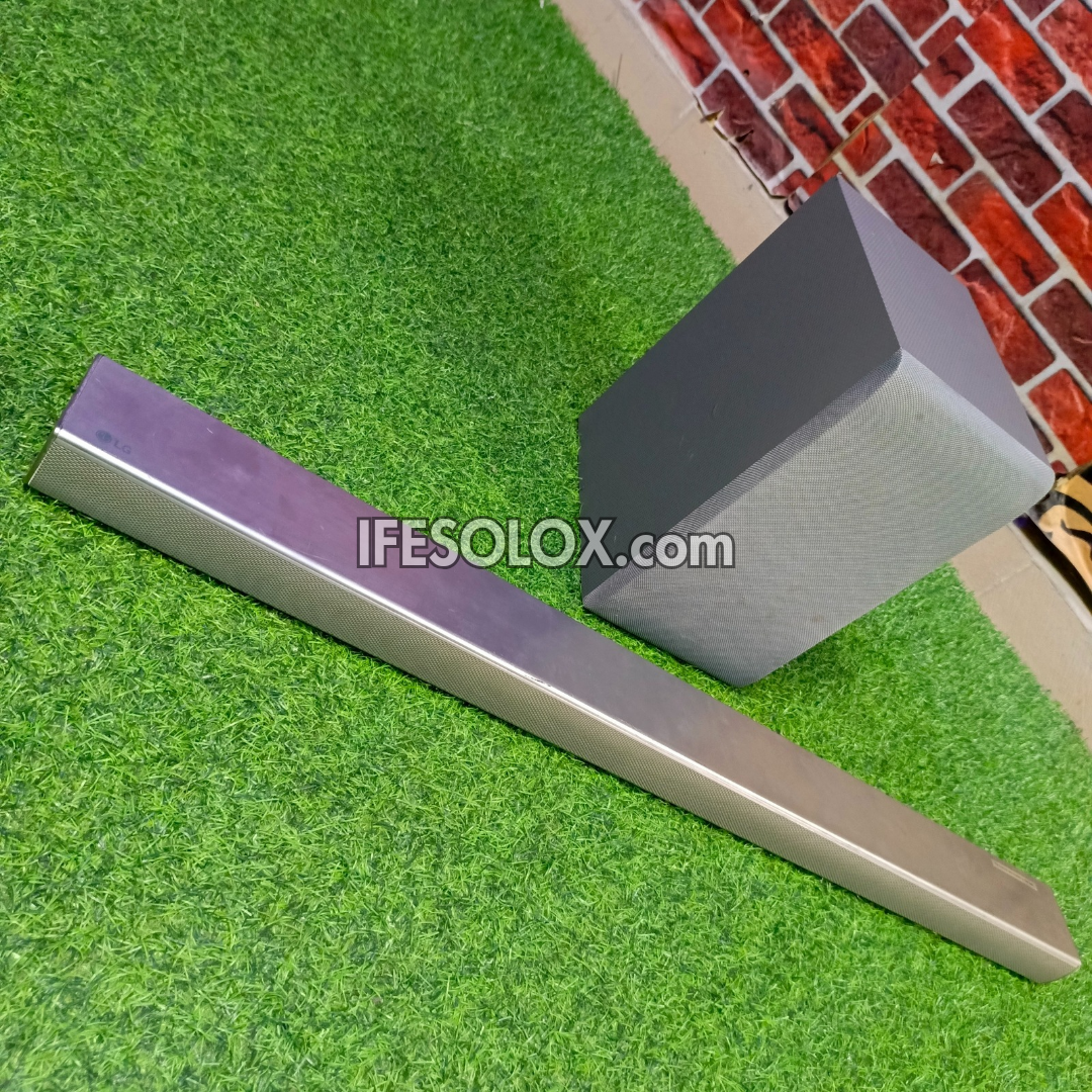 LG SH5 Bluetooth Sound Bar with Wireless Subwoofer - Foreign Used
