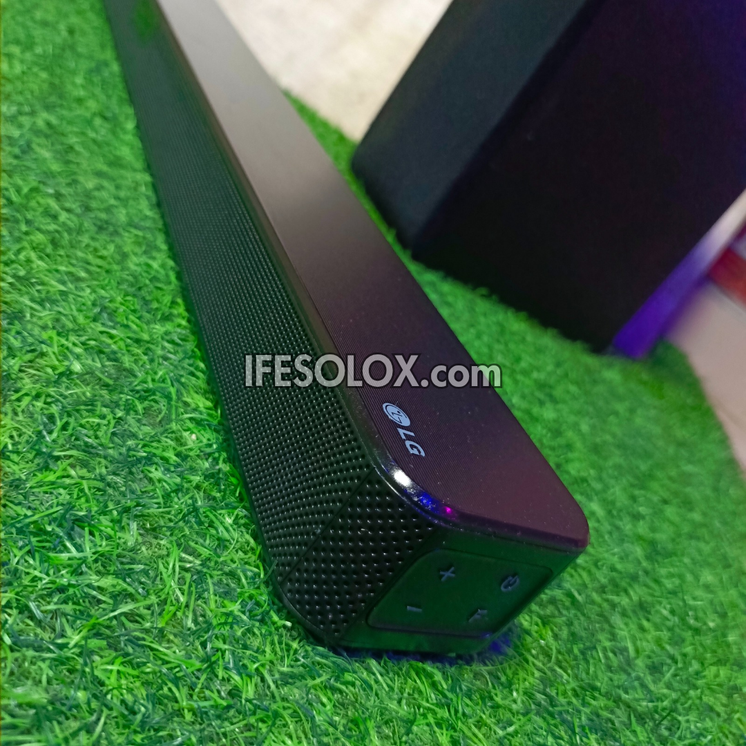 LG SN4 2.1Ch 300Watts High Resolution Bluetooth Sound Bar with Wireless Subwoofer (HDMI In/Out) - Foreign Used