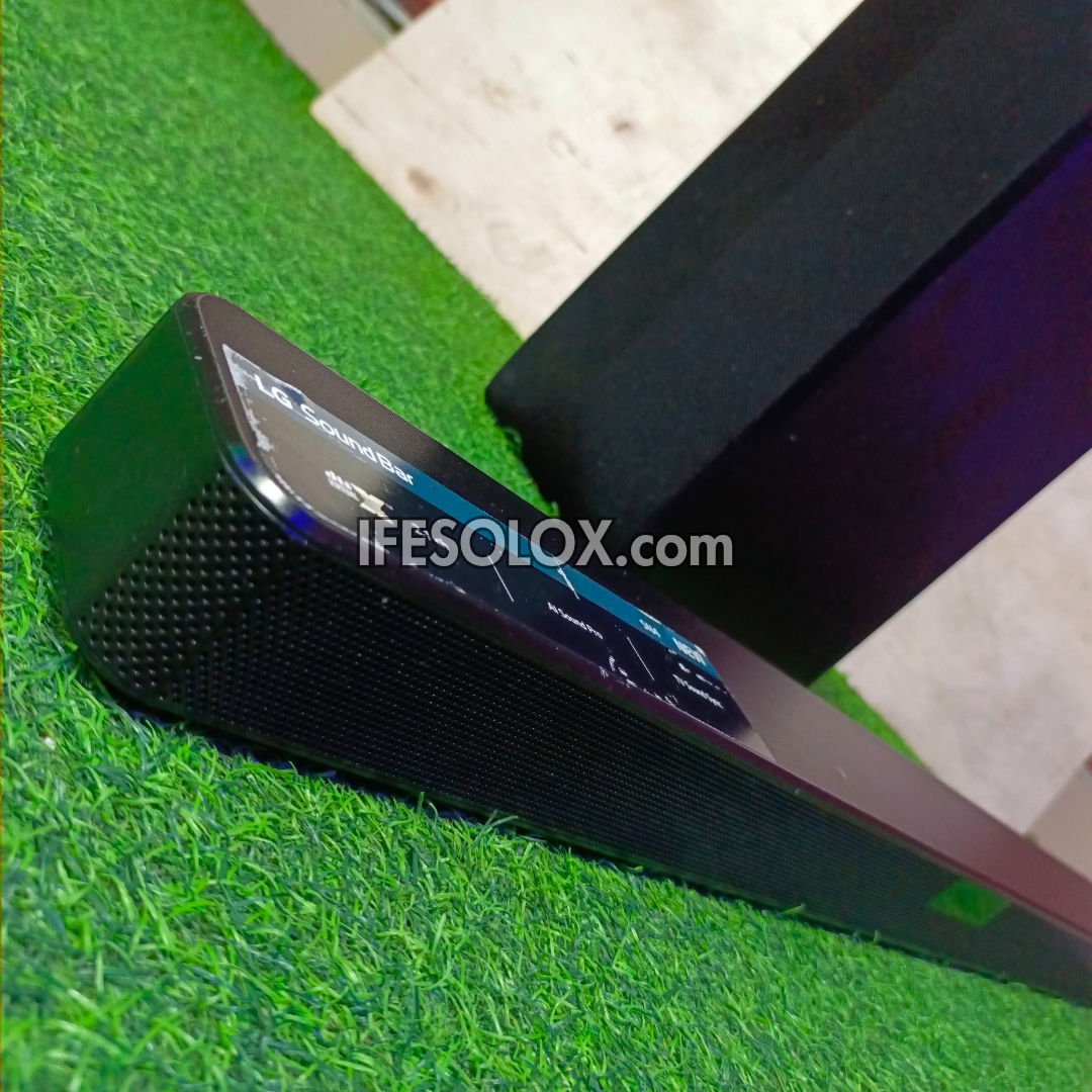 LG SN4 2.1Ch 300Watts High Resolution Bluetooth Sound Bar with Wireless Subwoofer (HDMI In/Out) - Foreign Used