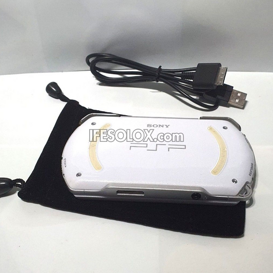 PlayStation Portable PSP Go N1000 series Game Console with 16GB Memory Stick and 20 Games (White) - Foreign Used