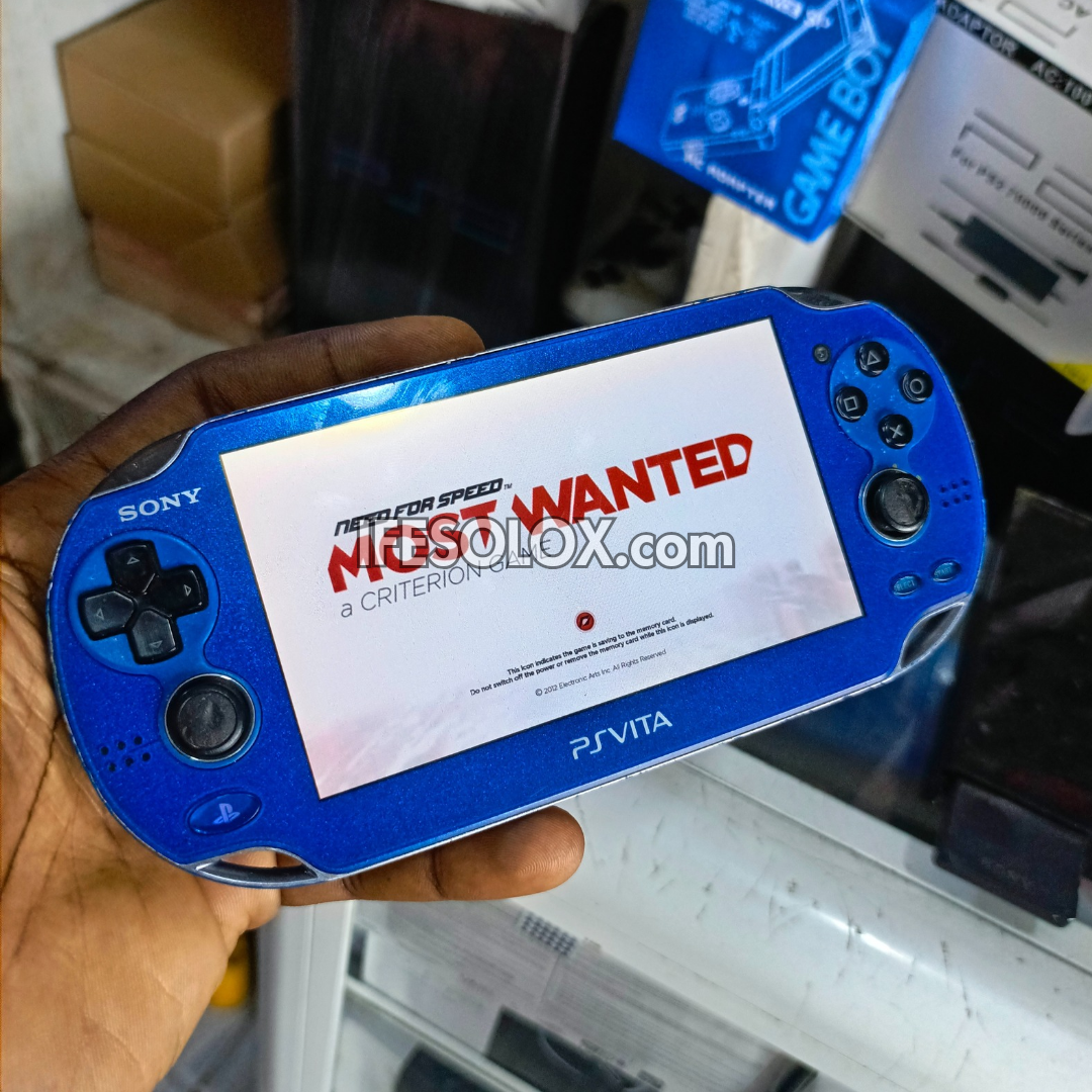 PlayStation VITA PCH-1000 Series Game Console + 32GB Memory Stick and 10 Games (Blue) - Foreign Used