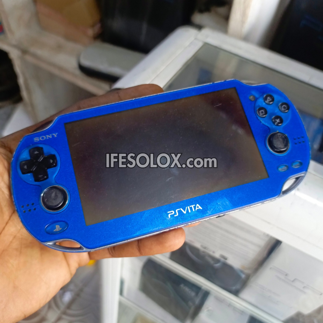 PlayStation VITA PCH-1000 Series Game Console + 32GB Memory Stick and 10 Games (Blue) - Foreign Used