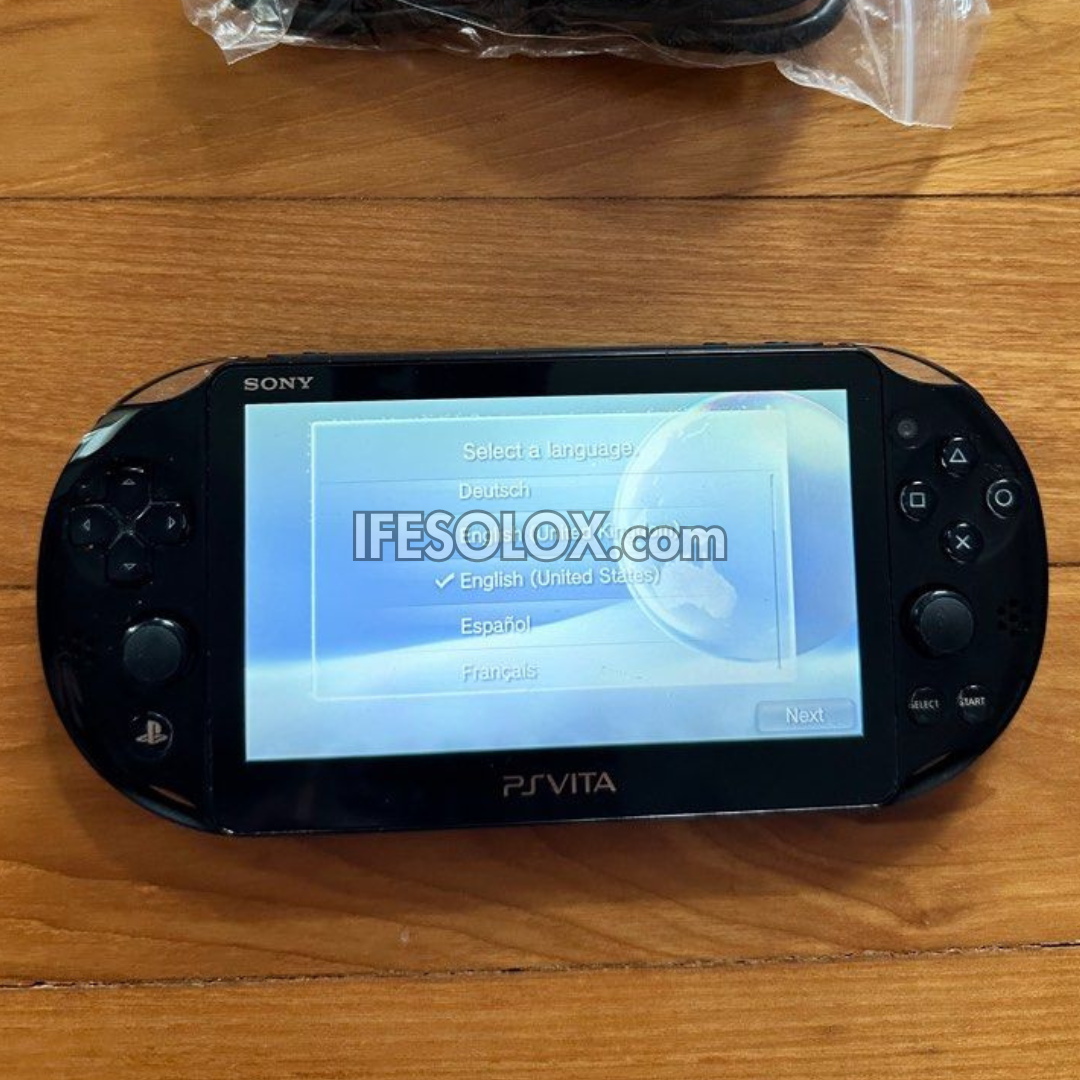 PlayStation VITA PCH-2000 Series Slim Game Console + 16GB Memory Stick and 15 Games (Black) - Foreign Used