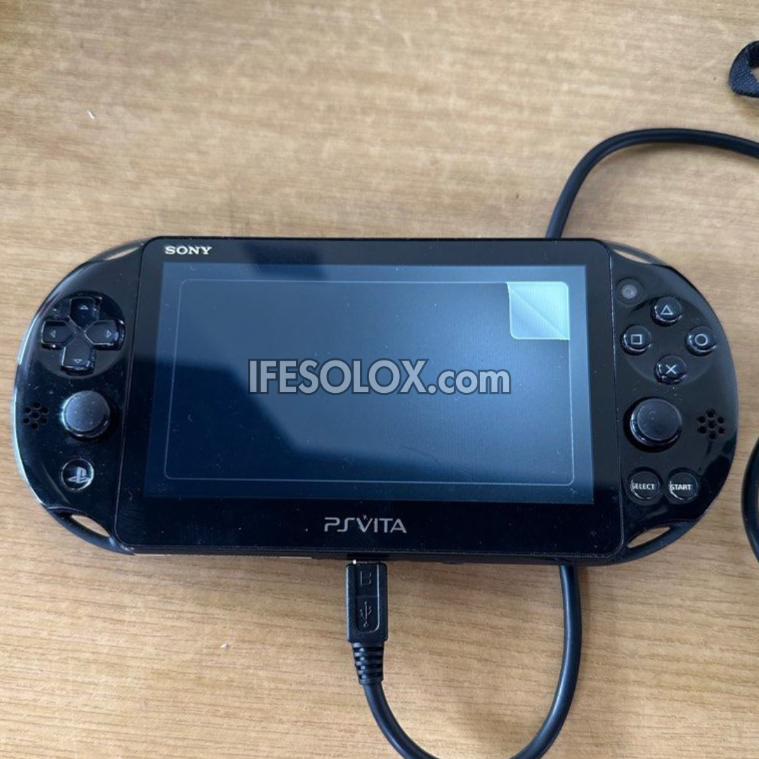 PlayStation VITA PCH-2000 Series Slim Game Console + 16GB Memory Stick and 15 Games (Black) - Foreign Used