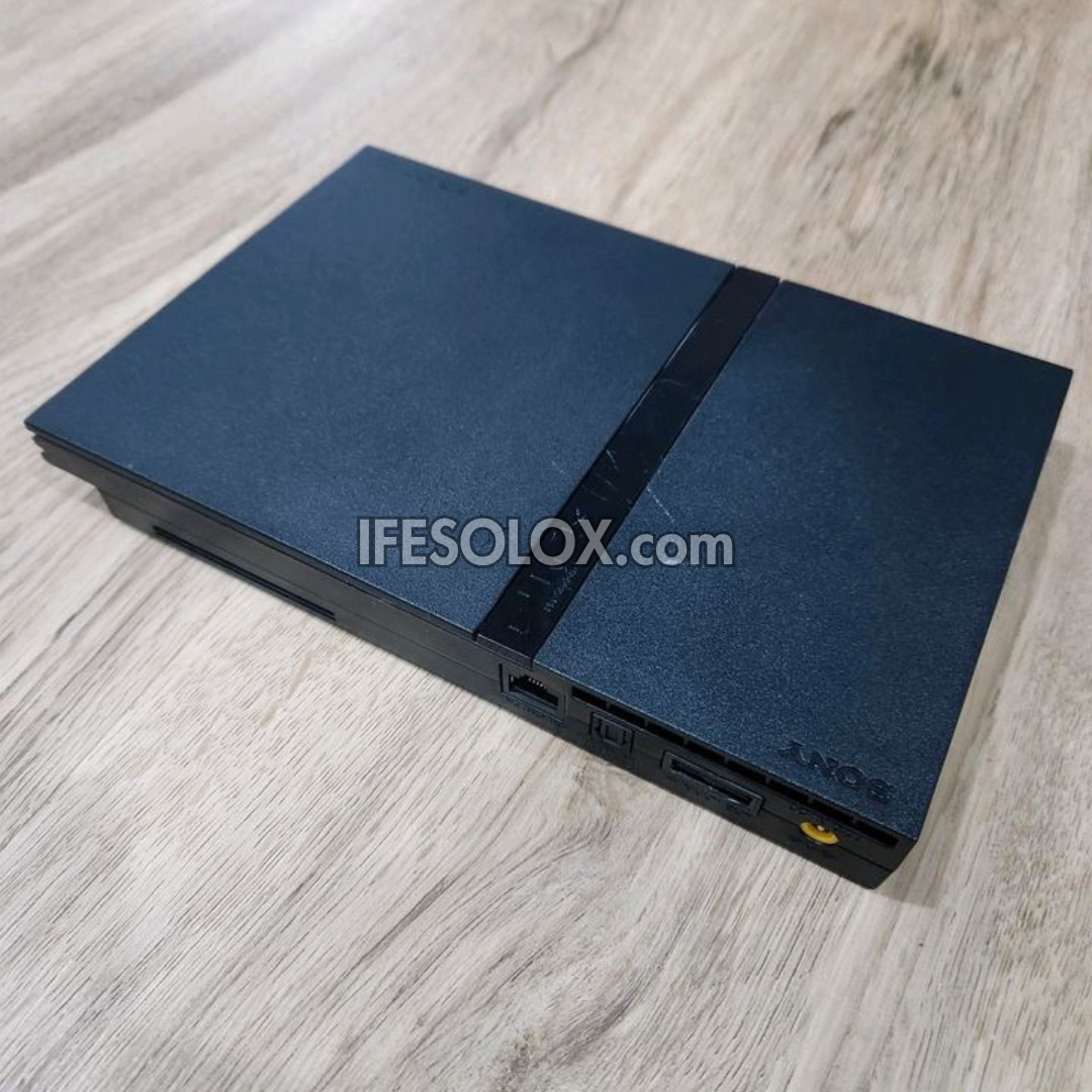 Sony Playstation 2 (PS2) Slim Game Console Complete Set with 2 DUALSHOCK Wired Controllers & 10 Titles - Foreign Used