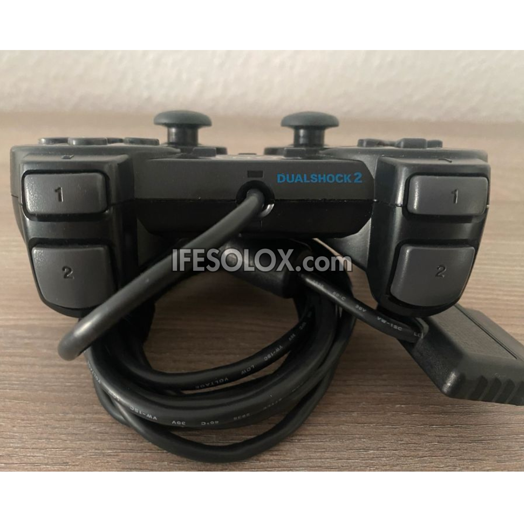 Sony Playstation 2 (PS2) Slim Game Console Complete Set with 2 DUALSHOCK Wired Controllers & 10 Titles - Foreign Used