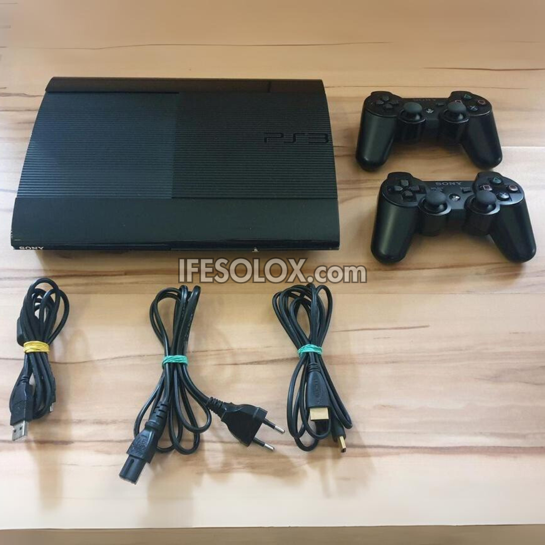 Sony Playstation 3 (PS3) Super Slim 500GB Game Console Complete Set with 2 DUALSHOCK Controllers and 30 Titles - Foreign Used