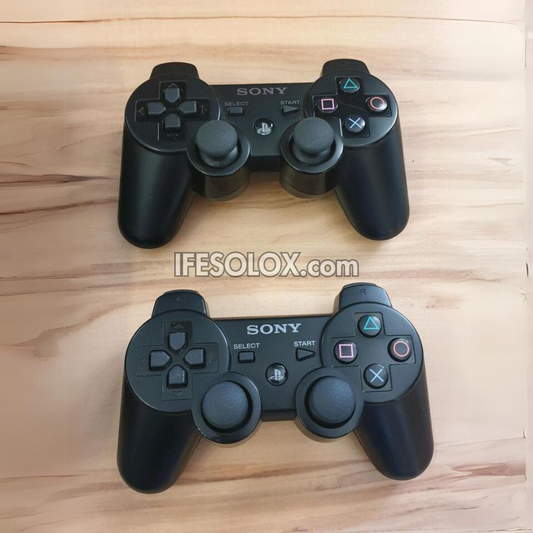 Sony Playstation 3 (PS3) Super Slim 500GB Game Console Complete Set with 2 DUALSHOCK Controllers and 30 Titles - Foreign Used