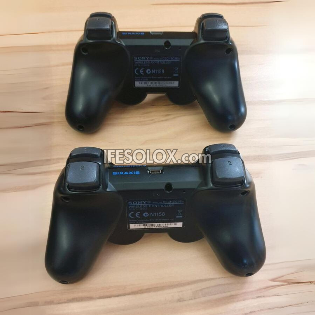 Sony Playstation 3 (PS3) Super Slim 500GB Game Console Complete Set with 2 DUALSHOCK Controllers and 30 Titles - Foreign Used