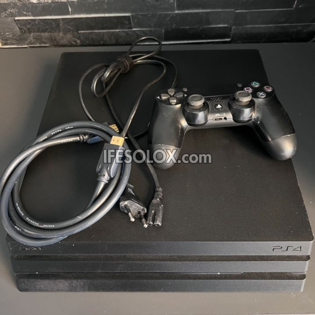 Sony Playstation 4 (PS4) Pro 1TB Game Console with 1 DUALSHOCK 3 Controllers - Foreign Used