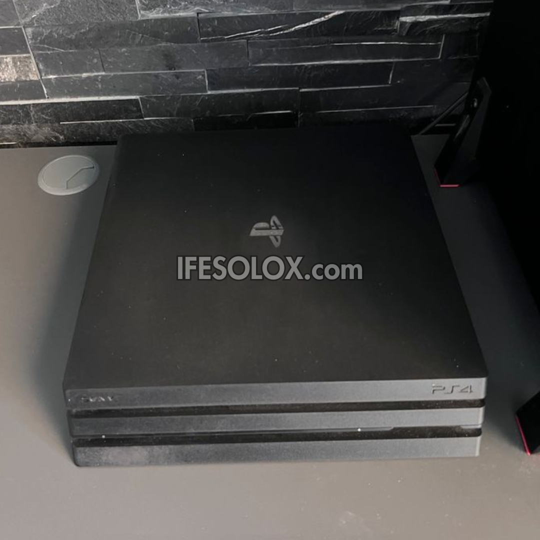 Sony Playstation 4 (PS4) Pro 1TB Game Console with 1 DUALSHOCK 3 Controllers - Foreign Used
