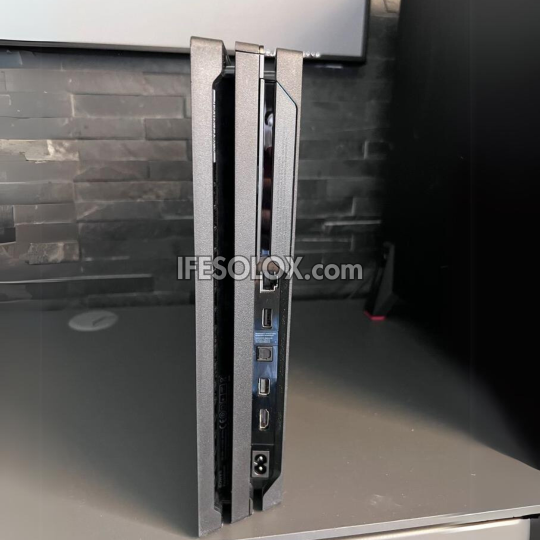 Sony Playstation 4 (PS4) Pro 1TB Game Console with 1 DUALSHOCK 3 Controllers - Foreign Used
