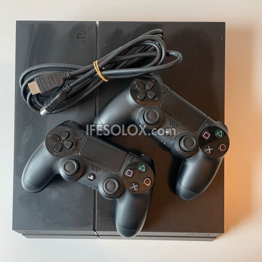 Sony Playstation 4 (PS4) 500GB Game Console with 2 DUALSHOCK 3 Controllers - Foreign Used