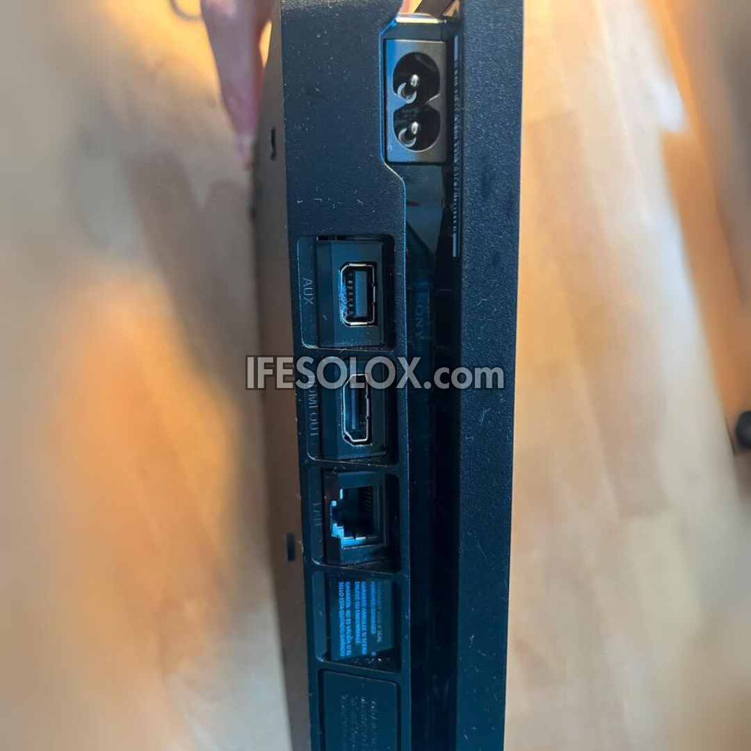 Sony Playstation 4 (PS4) Slim 1TB Game Console with 2 DUALSHOCK 3 Controllers - Foreign Used