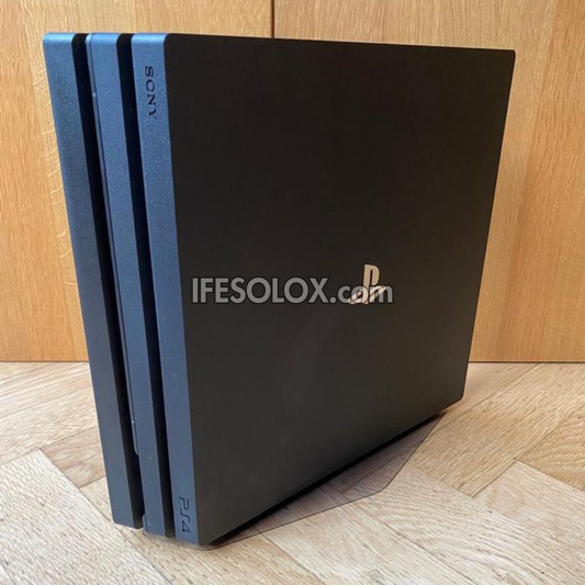 Sony Playstation 4 (PS4) Pro 1TB Game Console with 2 DUALSHOCK 3 Controllers with Charging Dock - Foreign Used
