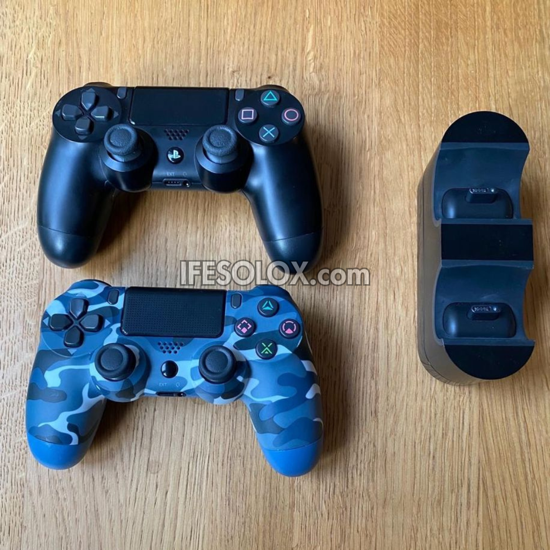 Sony Playstation 4 (PS4) Pro 1TB Game Console with 2 DUALSHOCK 3 Controllers with Charging Dock - Foreign Used