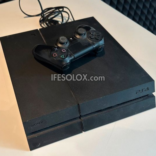Sony Playstation 4 (PS4) 500GB Game Console with 1 DUALSHOCK 4 Controller and 10 Titles - Foreign Used