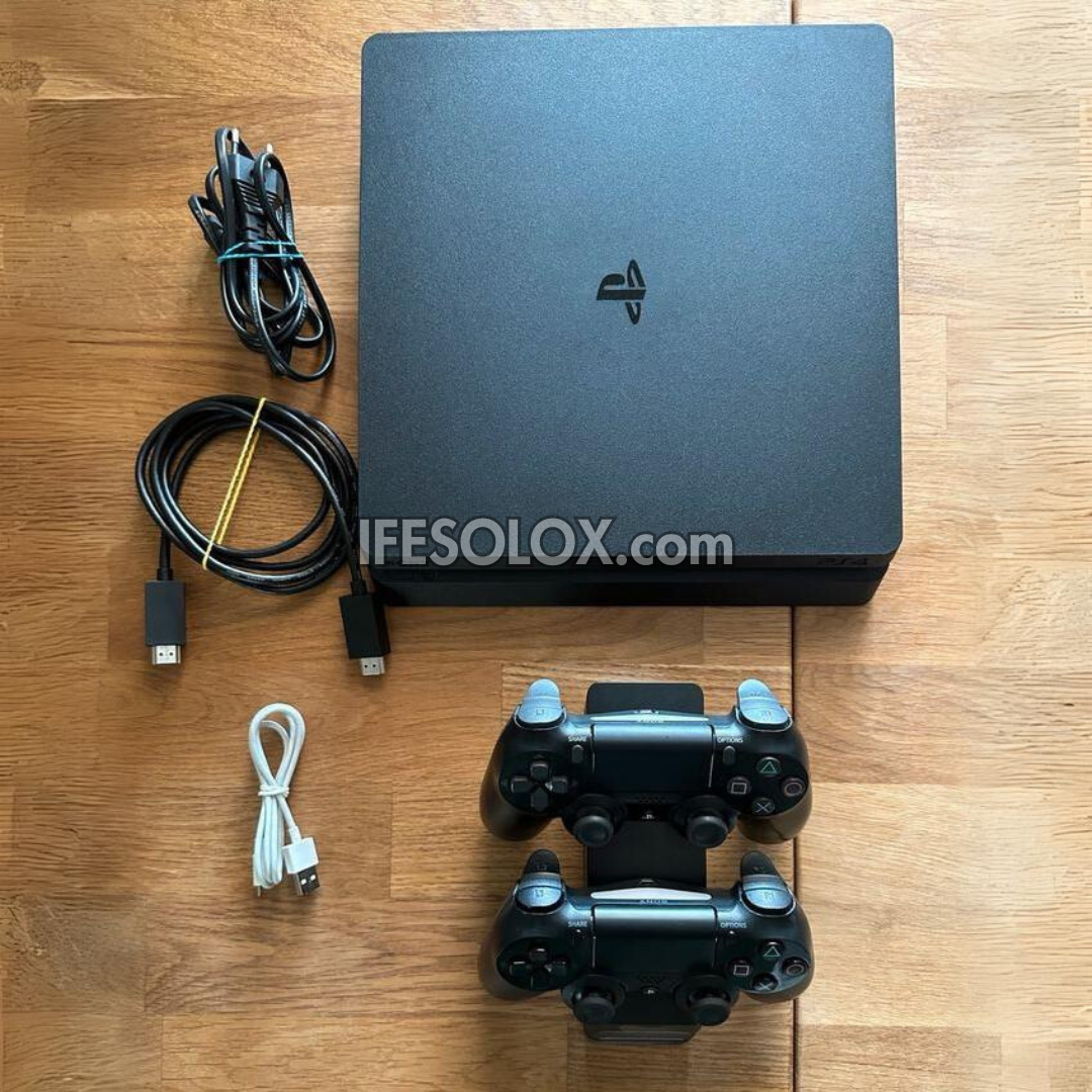 Sony Playstation 4 (PS4) Slim 1TB Game Console with 2 DUALSHOCK 3 Controllers - Foreign Used