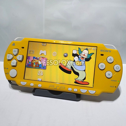 PlayStation Portable PSP 2000 series Game Console with 16GB Memory Stick and 15 Games (Yellow) - Foreign Used