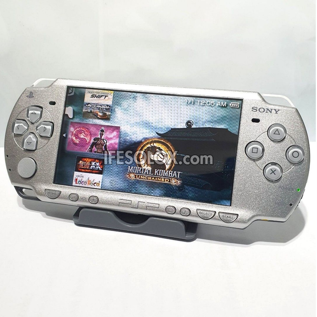 PlayStation Portable PSP 2000 series Game Console with 16GB Memory Stick and 15 Games (Silver) - Foreign Used