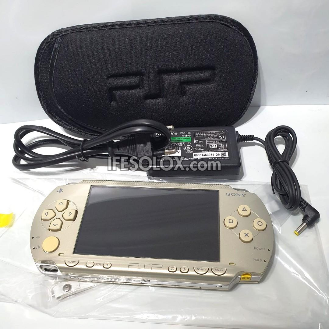 PlayStation Portable PSP 1000 series Game Console with 16GB Memory Stick and 15 Games (Gold) - Foreign Used