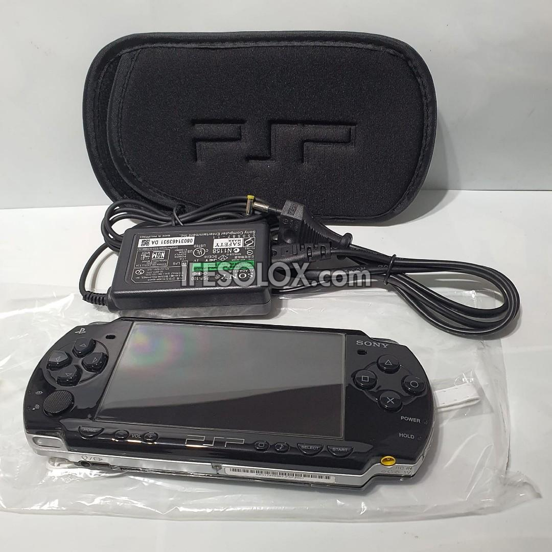 PlayStation Portable PSP 2000 series Slim Game Console with 16GB Memory Stick and 15 Games (Black) - Foreign Used