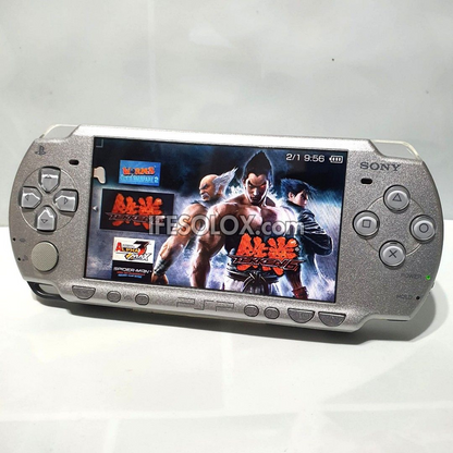 PlayStation Portable PSP 2000 series Slim Game Console with 16GB Memory Stick and 15 Games (Silver) - Foreign Used