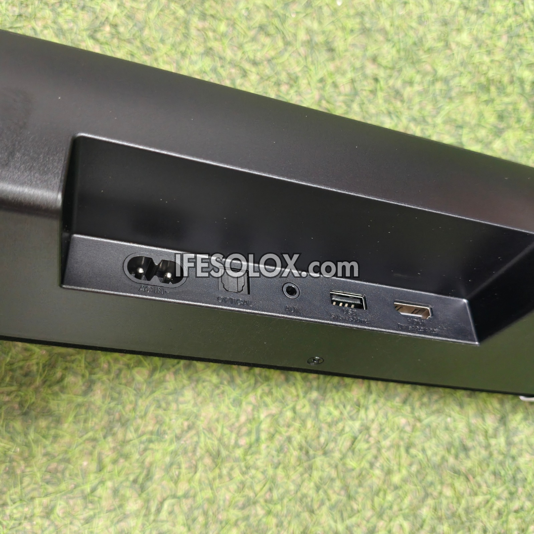 Close-up of the rear ports of a Hisense AX5100Q Sound Bar showing a power outlet, power switch, audio jack, USB-A port, and HDMI port