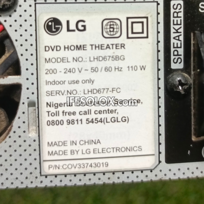 LG DVD home theater label with specifications and contact information.