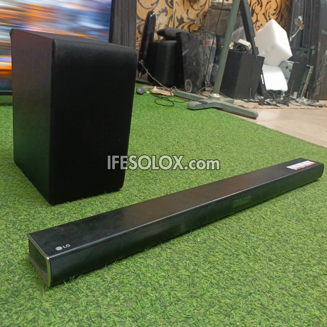 LG SH4 2.1Ch 300W Bluetooth Sound Bar with Wireless Subwoofer (USB, HDMI In/Out, Aux) - Foreign Used