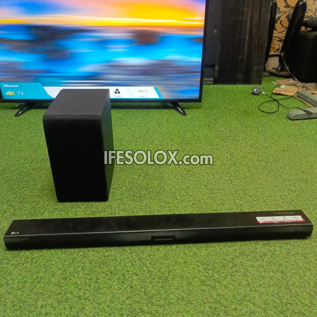 LG SH4 2.1Ch 300W Bluetooth Sound Bar with Wireless Subwoofer (USB, HDMI In/Out, Aux) - Foreign Used