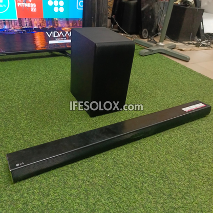 LG SH4 2.1Ch 300W Bluetooth Sound Bar with Wireless Subwoofer (USB, HDMI In/Out, Aux) - Foreign Used