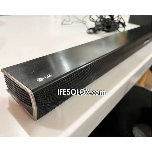 LG SH4 2.1Ch 300W Bluetooth Sound Bar with Wireless Subwoofer and HDMI (In & Out) - Foreign Used