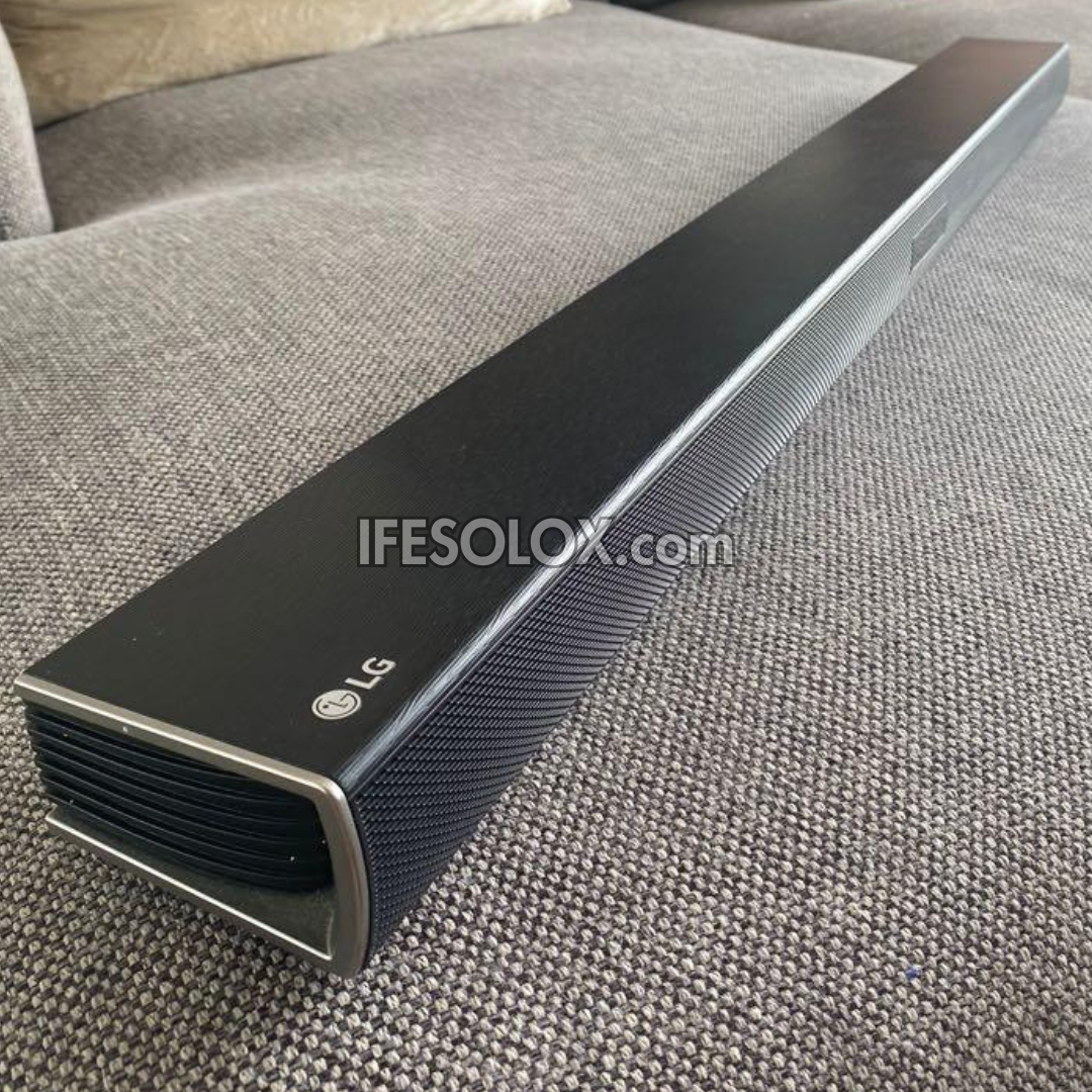 LG SJ4 2.1Ch 300W Bluetooth Sound Bar with Wireless Subwoofer and HDMI (In & Out) - Foreign Used