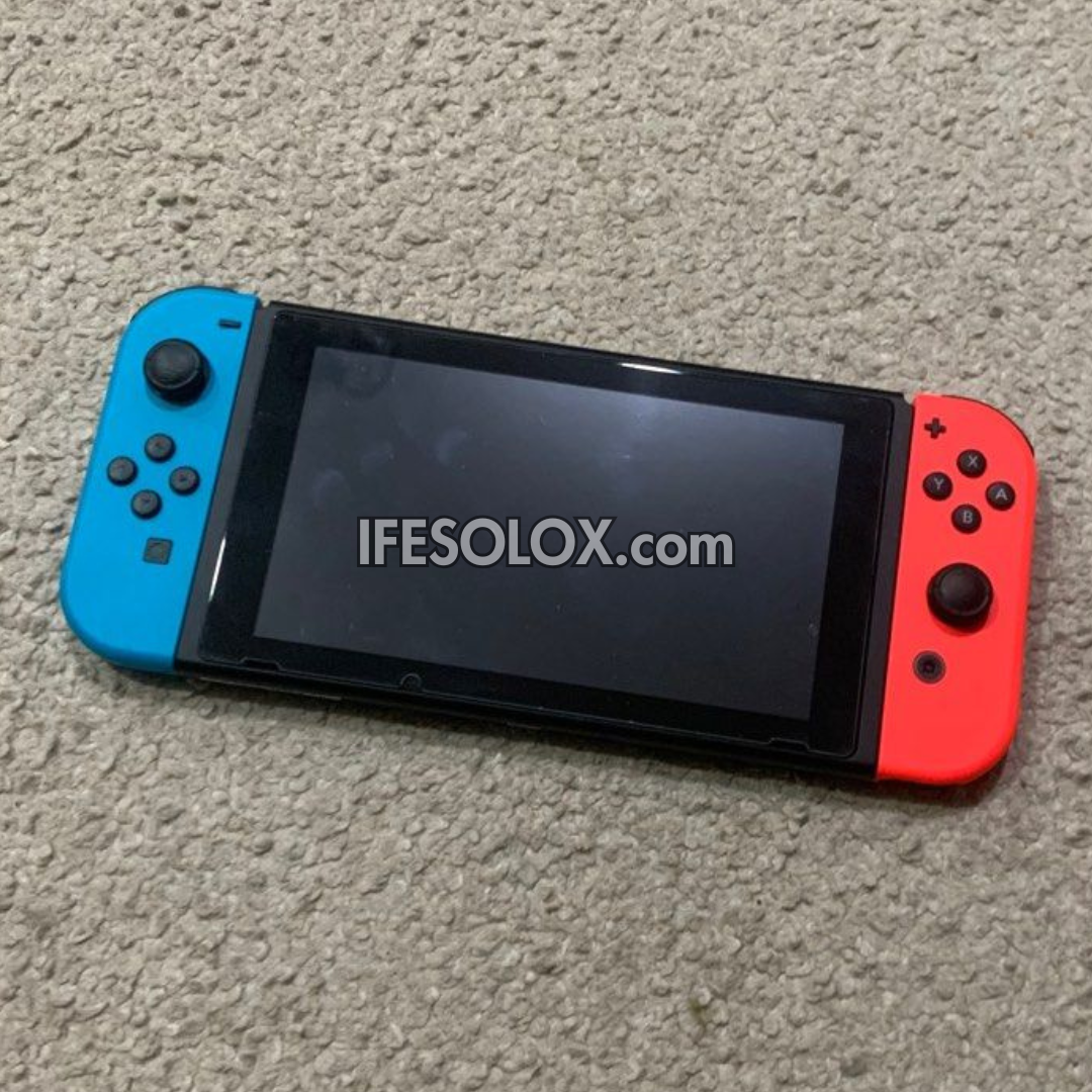 Nintendo Switch V1 Portable Video Game Console with 32GB Memory and 10 Games - Foreign Used