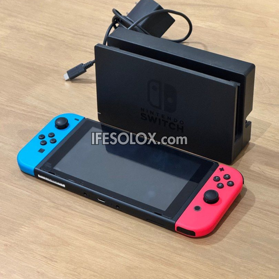 Nintendo Switch V1 Portable Video Game Console with 32GB Memory and 10 Games - Foreign Used