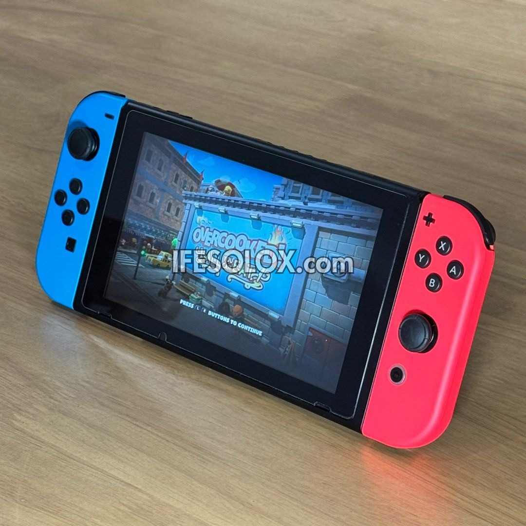 Nintendo Switch V1 Portable Video Game Console with 32GB Memory and 10 Games - Foreign Used