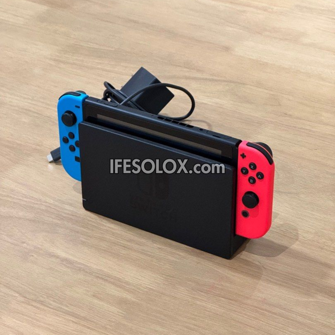 Nintendo Switch V1 Portable Video Game Console with 32GB Memory and 10 Games - Foreign Used
