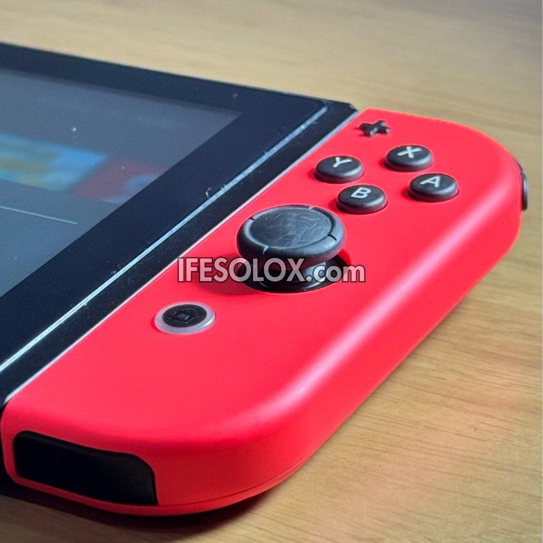 Nintendo Switch V1 Portable Video Game Console with 32GB Memory and 10 Games - Foreign Used