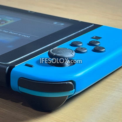 Nintendo Switch V1 Portable Video Game Console with 32GB Memory and 10 Games - Foreign Used