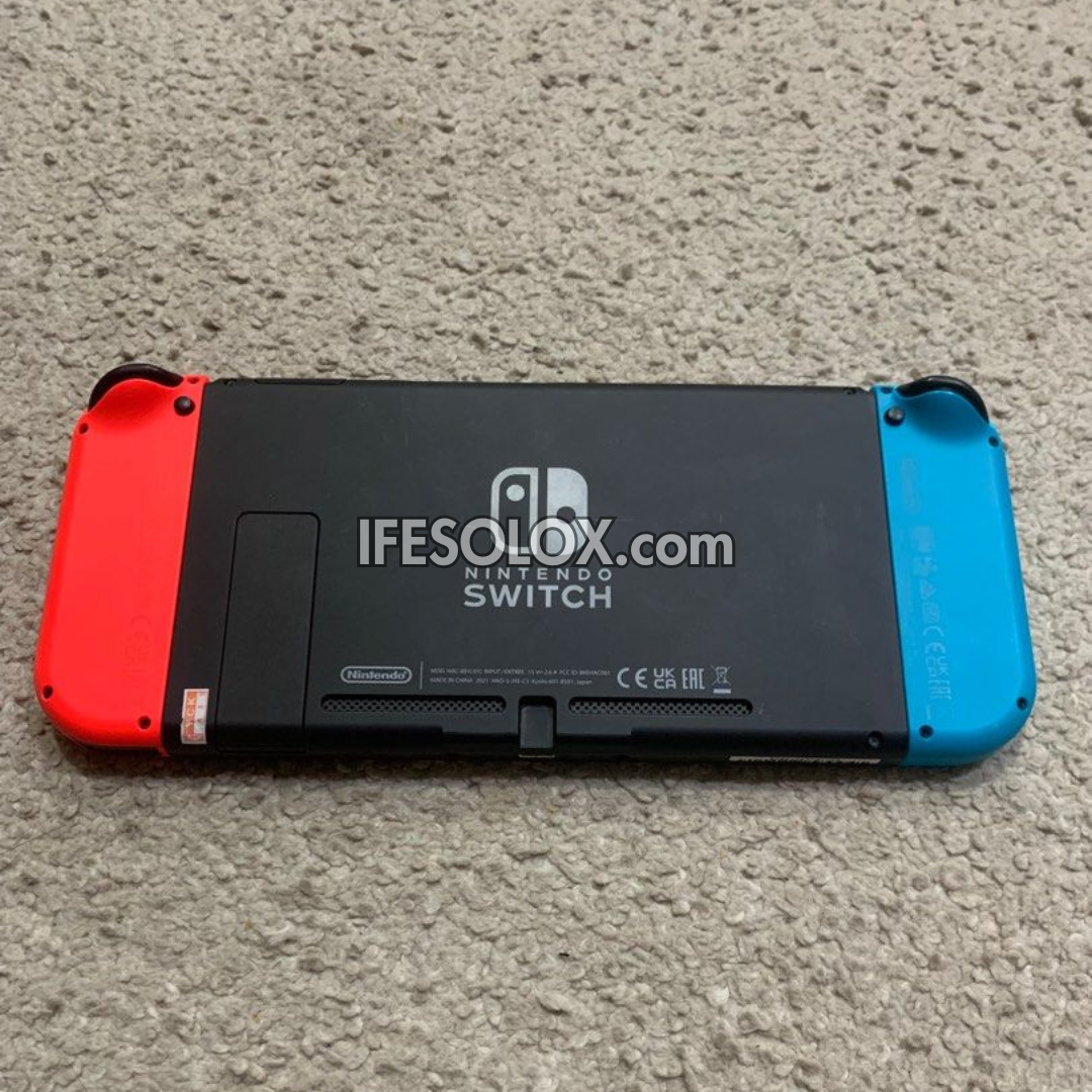 Nintendo Switch V1 Portable Video Game Console with 32GB Memory and 10 Games - Foreign Used